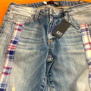 KUT brand jeans with tags. Has red & blue design on front.